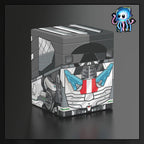 A stylized 3D render of a grey robotic cube box with red and green mechanical details, shown on a dark gradient background. A Wheeljack from Transformers made by Ultimate Guard deck box to best protect TCG Pokemon Magic The Gathering MTG Riftbound Lorcana Gundam.